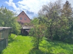 Einfamilienhaus mit großem Garten, 2 Garagen, Carport - sofort frei! - Bild